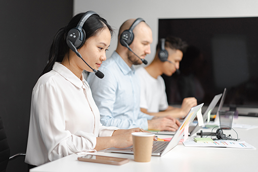 Employees of Deltona Company Using Newly Installed Business Phone Systems